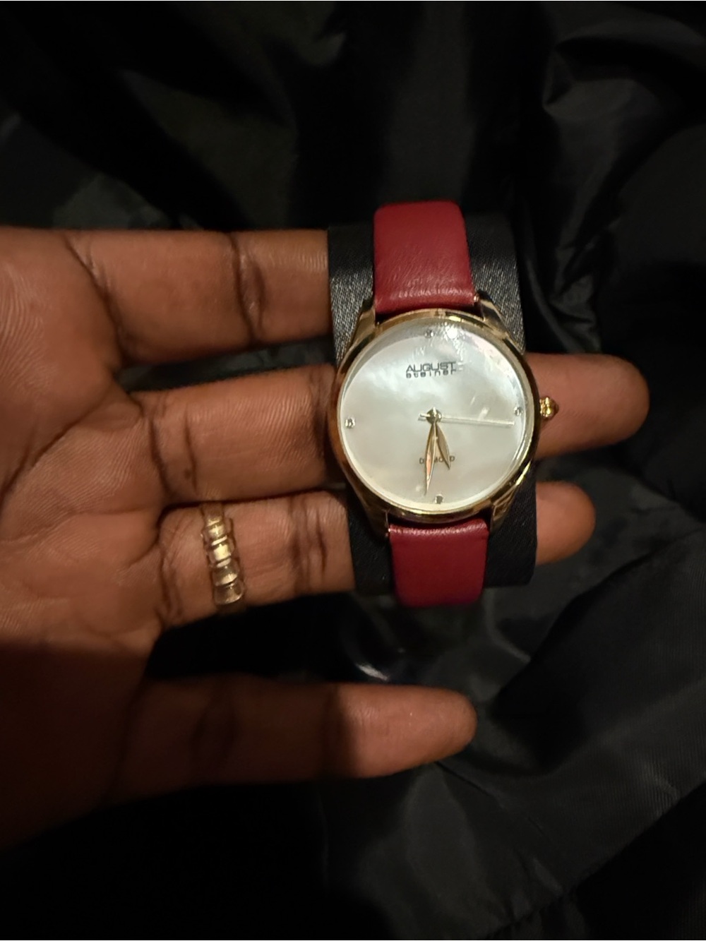 August Steiner Gold-Tone Watch with Red Leather Strap and White Dial